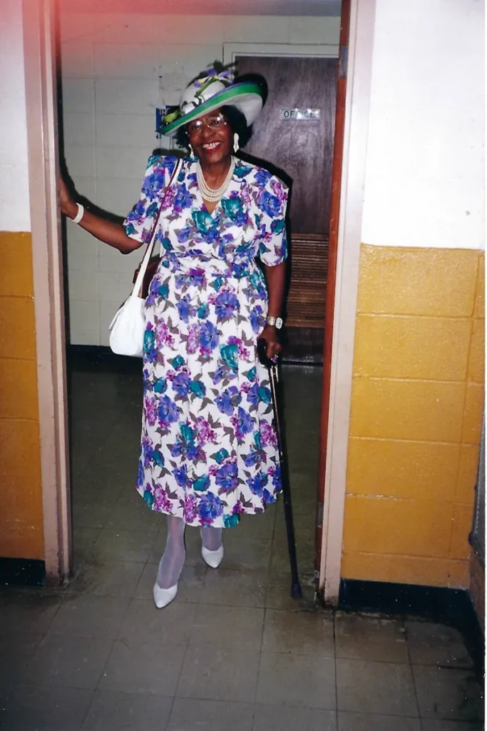 Dolores at church in a floral dress